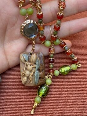 Artisan Green and Brown Beaded Necklace with Ant Carved Pendant